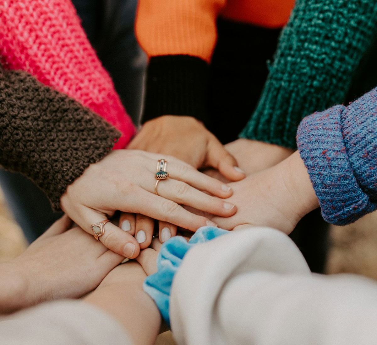 Supportive hands showing expert care and compassion.