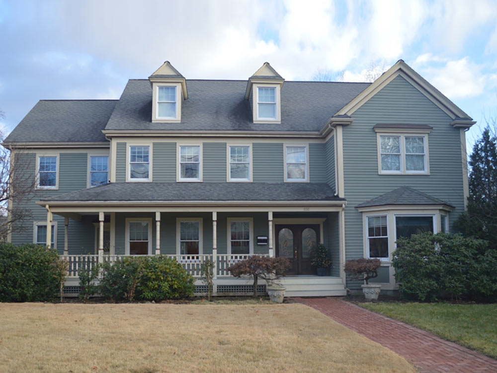 The welcoming exterior of the Tharros Boston residence.